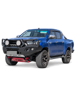 Hilux GT Upgrade Pack - white studio photo of an example Hilux; additional accessories shown are not part of the pack