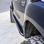 n80 hilux rock sliders angled - rockarmor 