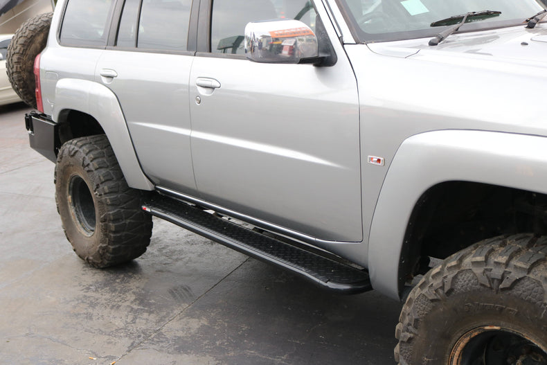 Nissan Gu patrol side step rock sliders